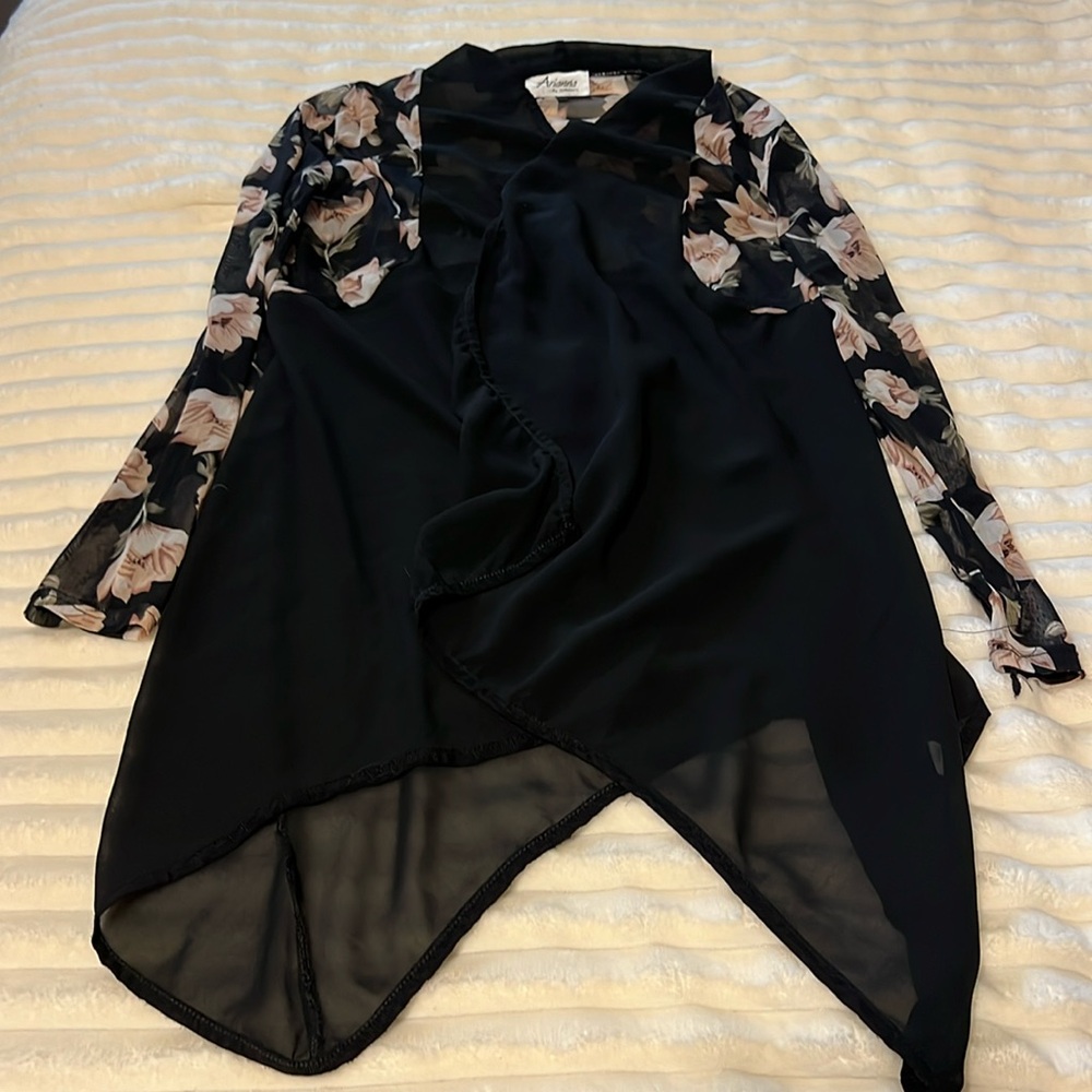 Good slip on light jacket to wear over a black t-shirt.